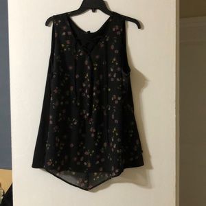 Sleeveless black blouse with small flowers. Size 18/20